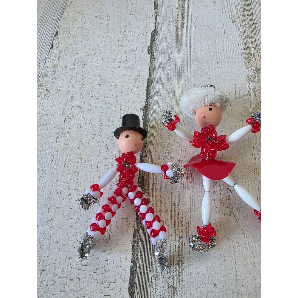 Vintage beaded wood skier couple ice skating ornament Xmas tree red white top